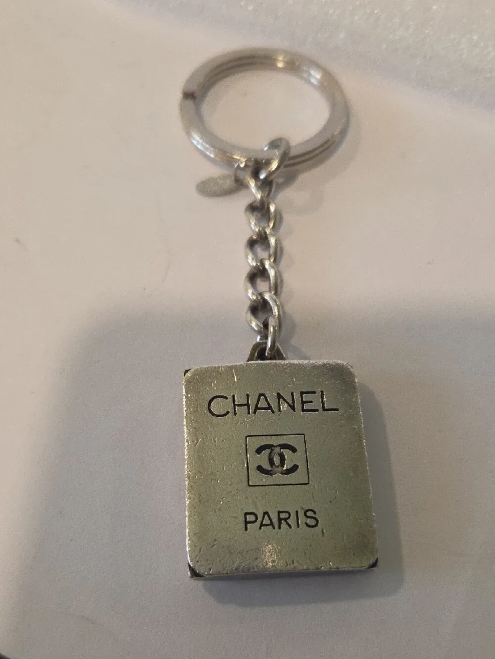 CHANEL Silver-Tone Metal Book Charm Keyring Vintage
